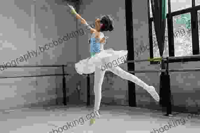 A Ballerina Performing A Graceful Leap In A Ballet Studio Basic Ballet Moves For A Hot Ballet Body