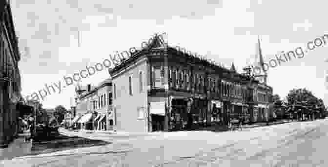 A Black And White Photograph Of The Main Street Of Lionsville In The Early 1900s. The Street Is Lined With Shops And Houses, And There Are People Walking And Riding Horses. Remembering Lionsville Bronwyn Bancroft