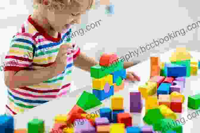 A Child Building A Block Tower, An Example Of The Importance Of Play Based Learning In The Upbringing Of Children Absolute Essentials In The Upbringing Of Children