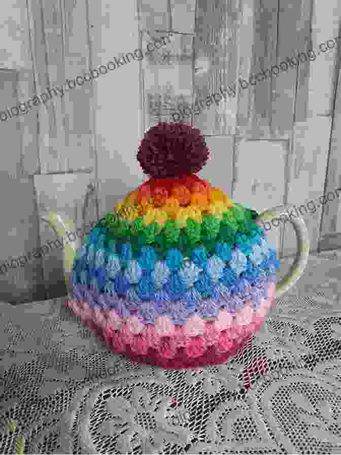 A Close Up Of The Rainbow Tea Cosy Crochet Pattern, Showcasing The Intricate Stitches And Vibrant Colours Rainbow Tea Cosy Crochet Pattern (Easy Crochet 10)