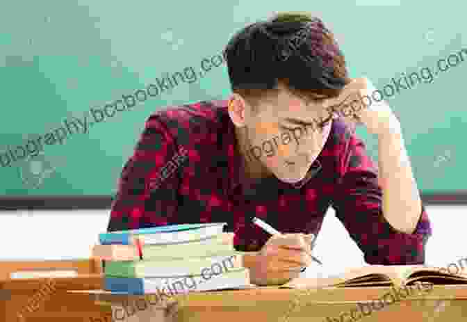 A Determined Student Studying Hard At A Desk How To Become A Straight A Student: The Unconventional Strategies Real College Students Use To Score High While Studying Less