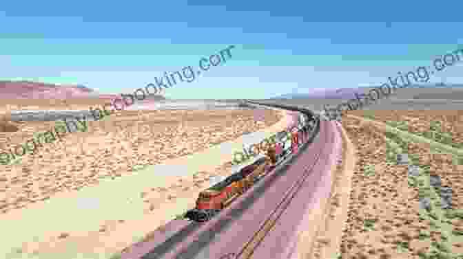 A Freight Train Disappears Into The Distance, Carrying The Freight Riders To Their Next Adventure. The Sunset Route: Freight Trains Forgiveness And Freedom On The Rails In The American West