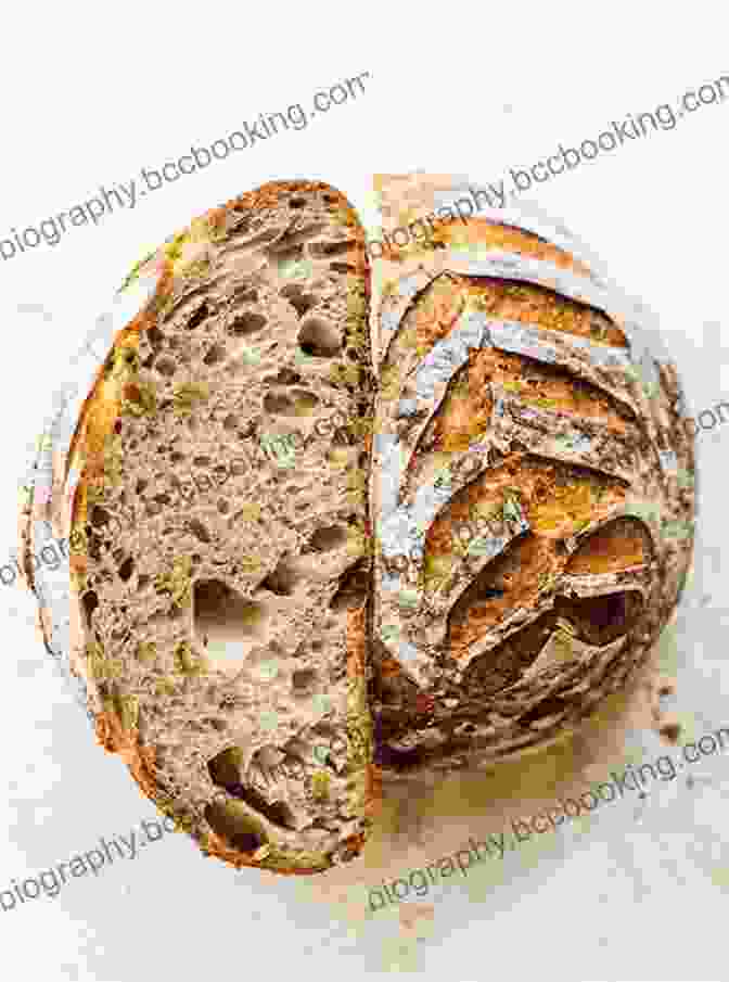 A Golden Brown Sourdough Bread Loaf With A Tangy And Chewy Crumb Sweet Loaf: 15 Sweet And Delicious Bread Recipes (Baking Dough Bread Machine)