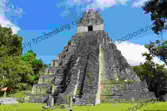 A Panoramic View Of The Sprawling Ruins Of Tikal, Amidst The Dense Guatemalan Rainforest, Hinting At The Grandeur Of The Ancient Maya City. The Mayas On The Rocks: A Fun Journey Through The World Of The Ancient Maya