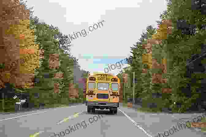 A Yellow School Bus Driving Down A Country Road, Surrounded By Vibrant Autumn Leaves. Riding The School Bus Caryn Jenner
