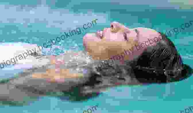 Person Getting Comfortable In A Pool How To Swim In Five Easy Steps