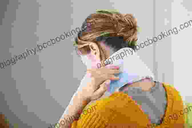 Woman Using A Heating Pad On Her Ear Home Remedies To Treat And Prevent EARACHE